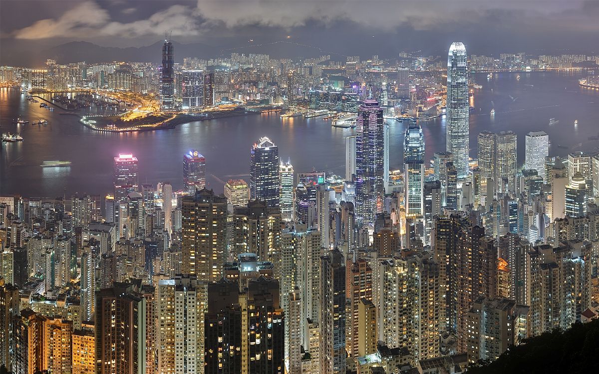 Hong Kong harbor at night. Source: Wikimedia.